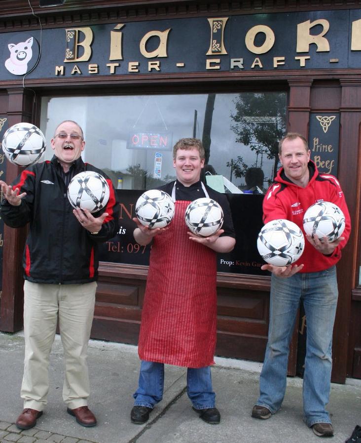Kiven presenting the football to Eric O'Reilly and Tom Reilly recently