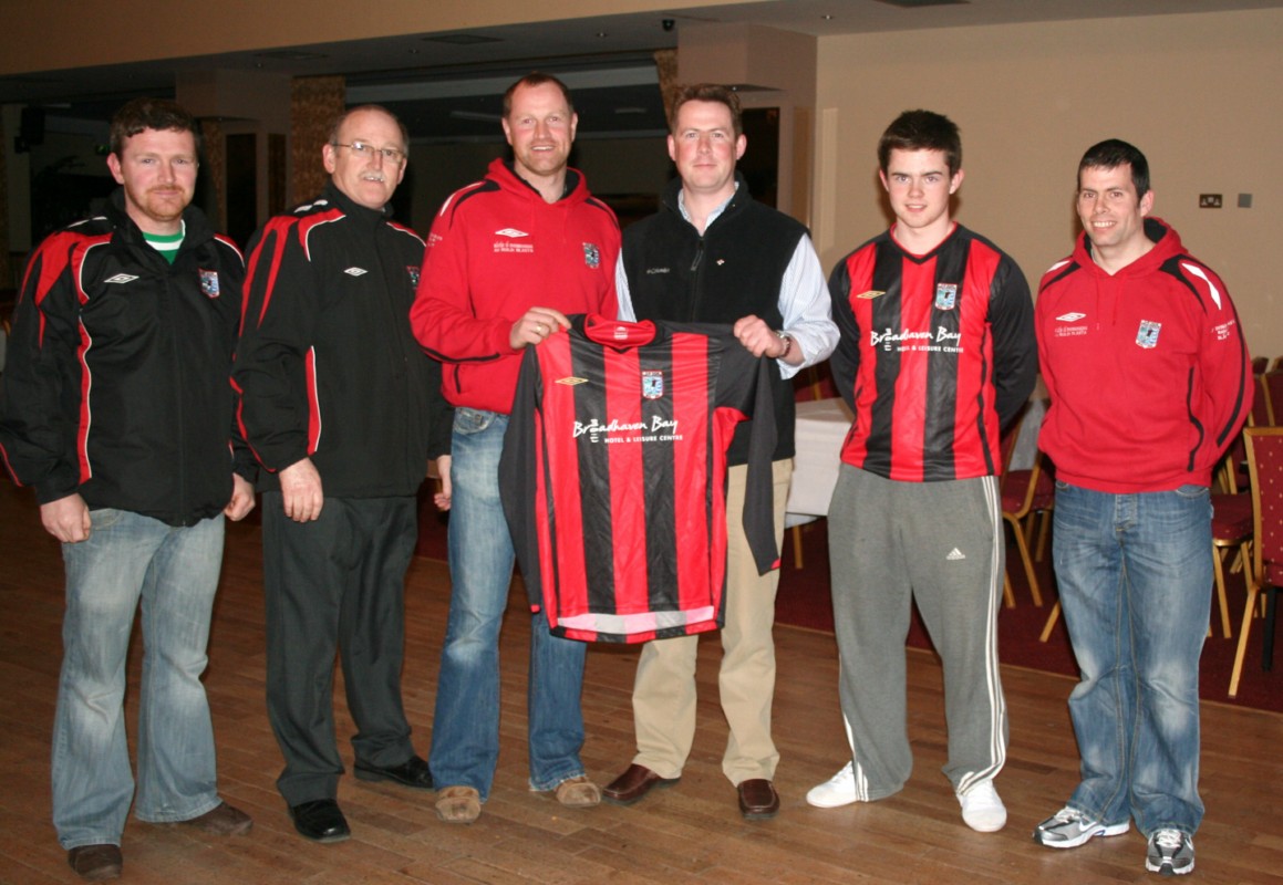 David Terrall, Manager of the Broadhaven Bay Hotel presenting the jerseys to youth Secritary, Eric O'Reilly with Tresurer, Paul Reilly, Chairman, Tom Reilly, Senior squad member, Sean Gaughan and Vice Chairman, Garth O'Malley